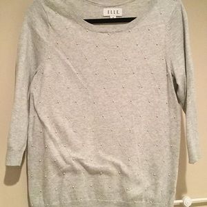Two pearl decorated long sleeve tops